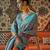 Kimisha women's teal silk woven saree with unstitched blouse piece
