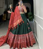 Green Color Dola Silk With Bandhani And Ajarakh Print Foil Work Lehenga Choli For Women