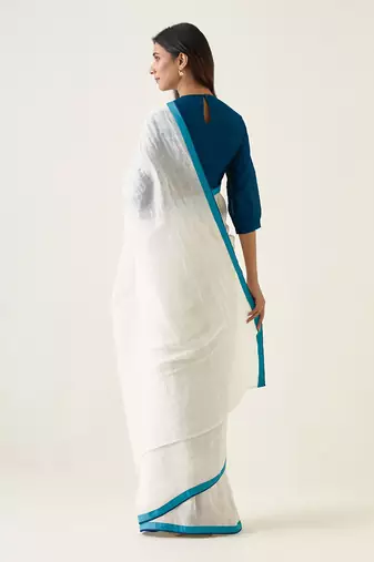 White & teal handcrafted linen silk saree set