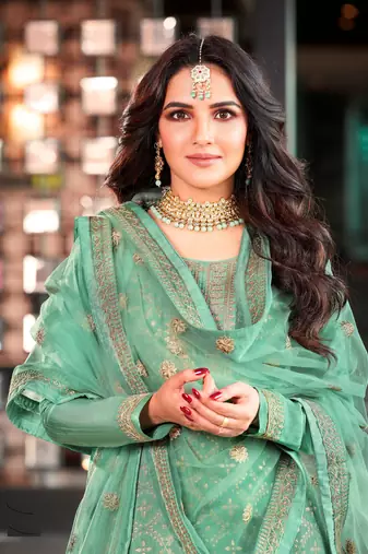 Green Colour Heavy Embroidered Partywear Salwar Kameez