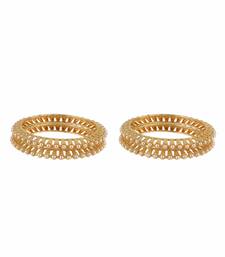 Women gold-plated white pearl-studded bangles