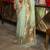 Kimisha women's green silk woven saree with unstitched blouse piece