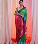 Green Cotton Blend Handwoven Saree With Flower Motifs