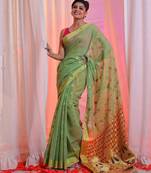 Pistachio Green Cotton Blend Handwoven Saree With Zari Woven Designs
