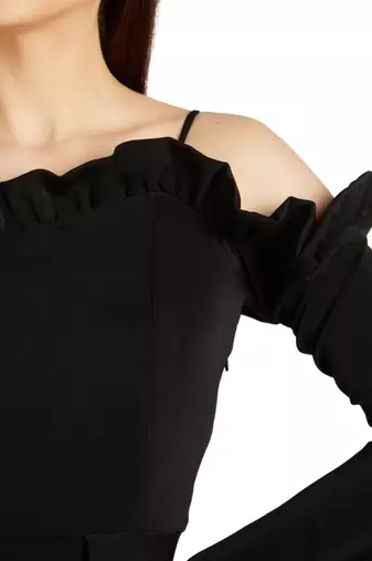One sleeve cold shoulder top with ruffle detail on neck