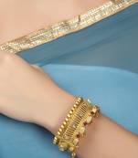Women set of two 24 ct gold-plated golden gugru party wear handcarfted stone-studded bangle