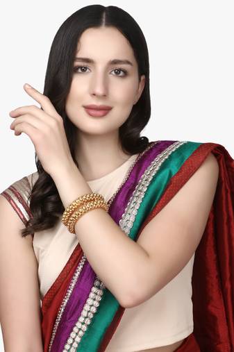 Set of 2 gold-plated antique bangles