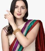 Set of 2 gold-plated antique bangles