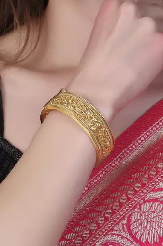 Women gold-plated stone-studded bangles
