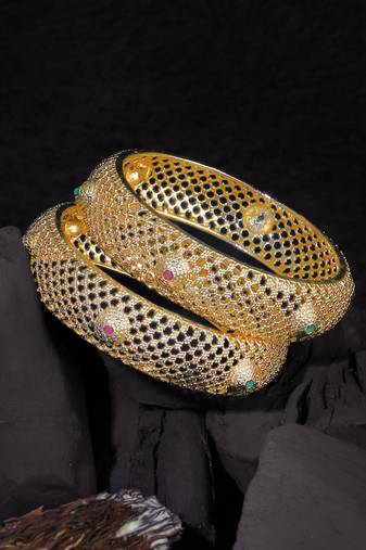 Women gold-plated pink and green stone-studded bangles