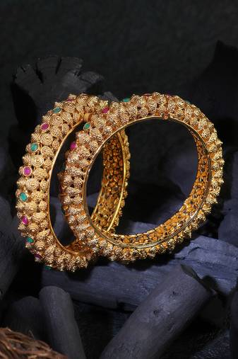 Women gold-plated pink and green stone-studded bangles