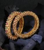 Women gold-plated pink and green stone-studded bangles