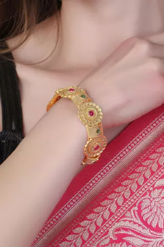 Women gold-plated pink and green stone-studded bangles