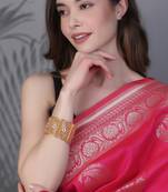 Women gold-plated stone-studded pearl-beaded bangles