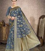 Graceful Designer Grey color Lichi Bindi Silk Saree with weaving work
