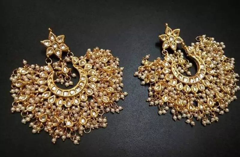 white pearl earring in kundan for traditional occasion and weddings