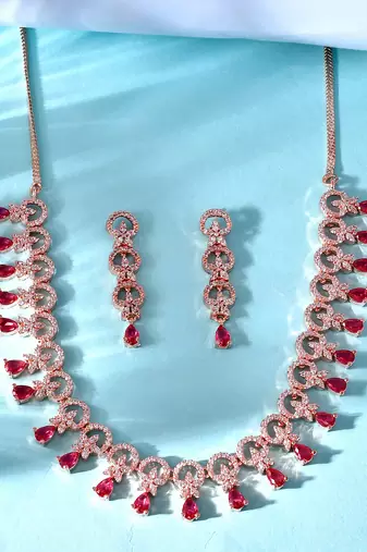 Rose gold-plated ad stone-studded handcrafted red jewellery set