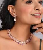 Rose gold-plated ad stone-studded handcrafted red jewellery set