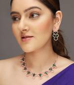 Rose gold-plated ad stone-studded handcrafted emerald jewellery set