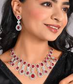 Silver-plated ad stone-studded handcrafted emerald jewellery set