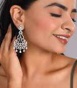 Silver-plated ad studded green and white crystal contemporary chandbali earrings