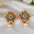 Antique goldplated green stone earrings embellished with pearls | traditional small stud earrings for women and girls