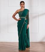 Bottle green pre draped saree and belt