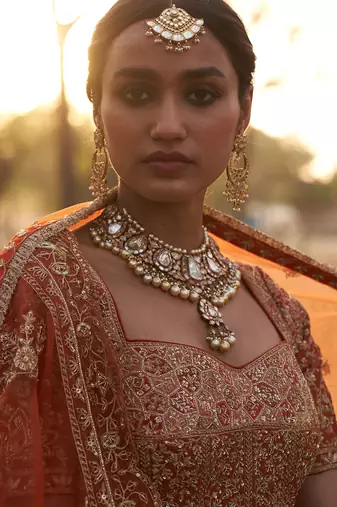 Rust Lehengas