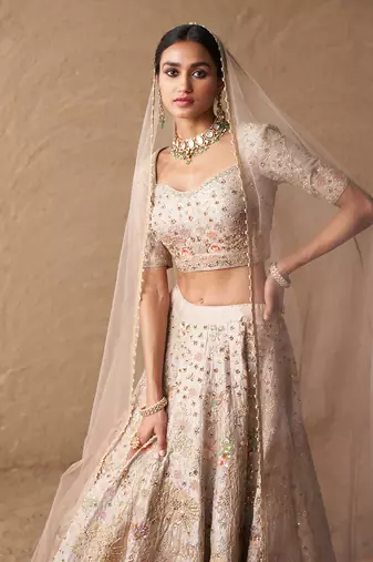 Ivory Lehengas