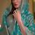 Kimisha women's turquoise blue organza woven saree with unstitched blouse piece