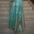 Kimisha women's turquoise blue organza woven saree with unstitched blouse piece