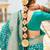 Kimisha women's turquoise georgette woven saree with unstitched blouse piece