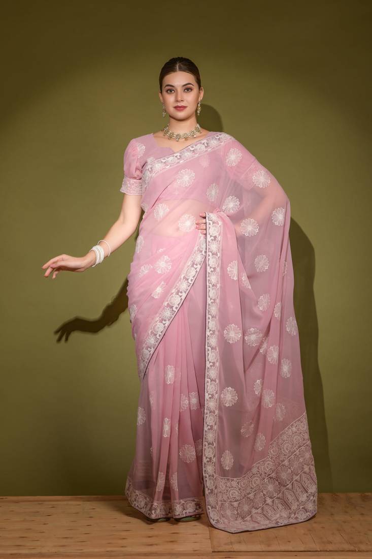 Pink color heavy laknavi threads work and same work lace border  all over saree with unstiched blouse