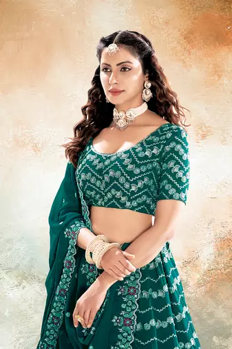 Emerald Green Embroidered Semi Stitched Lehenga and Unstitched Blouse with Dupatta