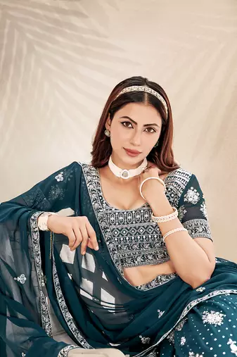 Teal Embroidered Semi Stitched Lehenga and Unstitched Blouse With Dupatta