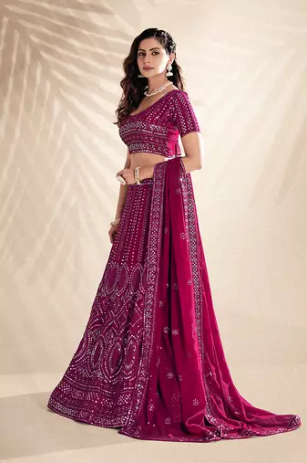 Rani Pink Embroidered Semi Stitched Lehenga and Unstitched Blouse With Dupatta