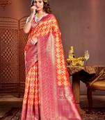 Sangam prints orange kanjivaram silk woven work traditional tassels saree