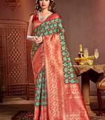 Sangam prints green kanjivaram silk woven work traditional tassels saree