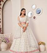SPARKLING IVORY COLOR SOFT NET WEDDING SPECIAL DESIGNER LEHENGA CHOLI
