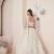 SPARKLING IVORY COLOR SOFT NET WEDDING SPECIAL DESIGNER LEHENGA CHOLI