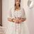 SPARKLING IVORY COLOR SOFT NET WEDDING SPECIAL DESIGNER LEHENGA CHOLI
