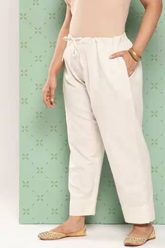 women cream pure cotton plus size slim fit trousers