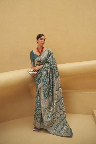 Kimisha women's dark green linen woven saree with unstitched blouse piece