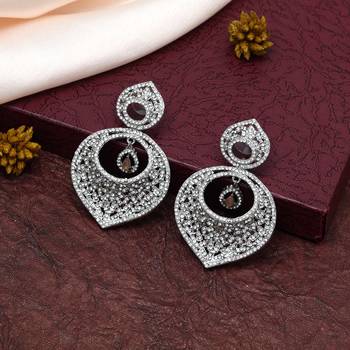 Peach color american diamond earrings 1