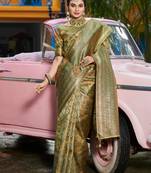 Sangam prints gold & green kanjivaram silk woven work traditional tassels saree