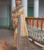 Sangam Prints Cream Banarasi Silk Woven Work Traditional Tassels Saree