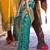 Kimisha women's green silk woven saree with unstitched blouse piece