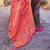 Kimisha women's coral silk woven saree with unstitched blouse piece