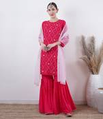 Rani pink embroidered kurta and sharara set with organza dupatta