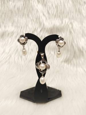 Mannat raj pearls & jewellers natural fresh water pearls hyderabadi pearls charming and designer pendant set 1